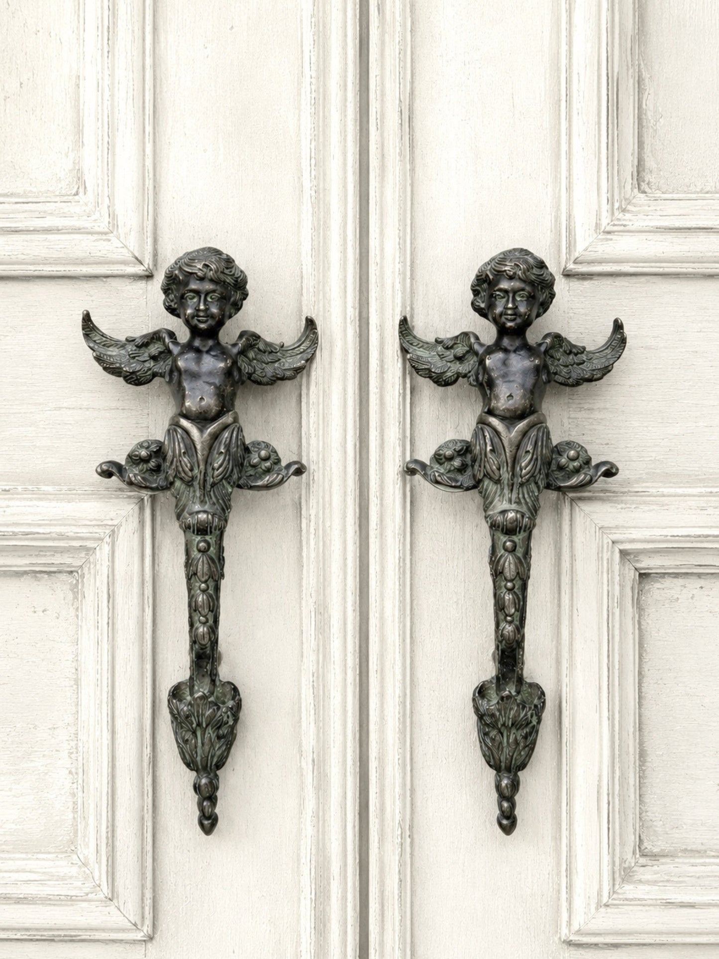 Pair of antique French solid bronze door handles