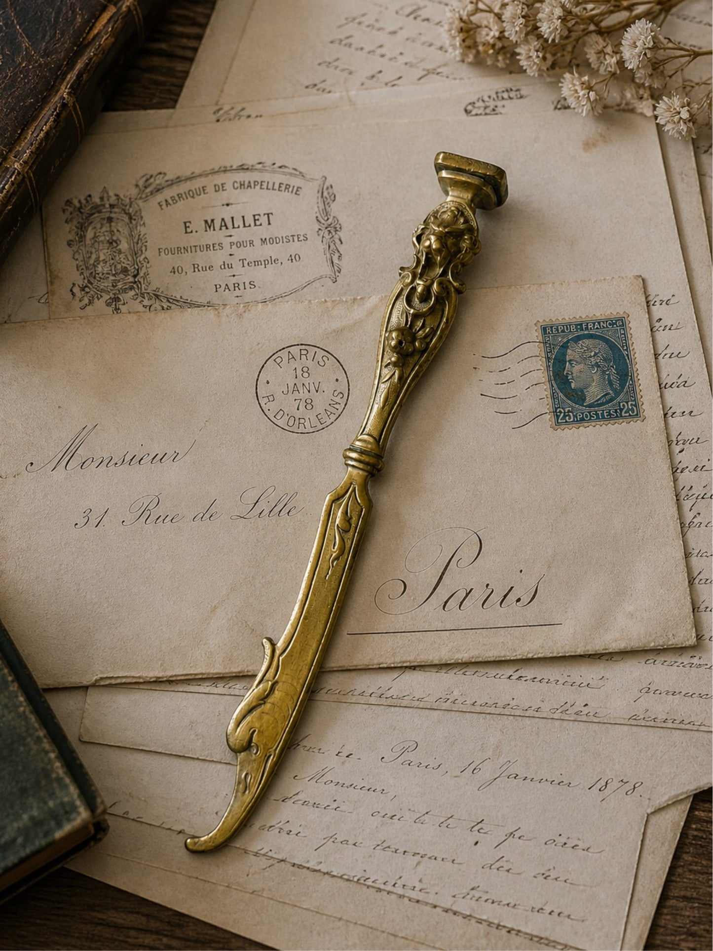 Elegant antique letter opener with monogram seal