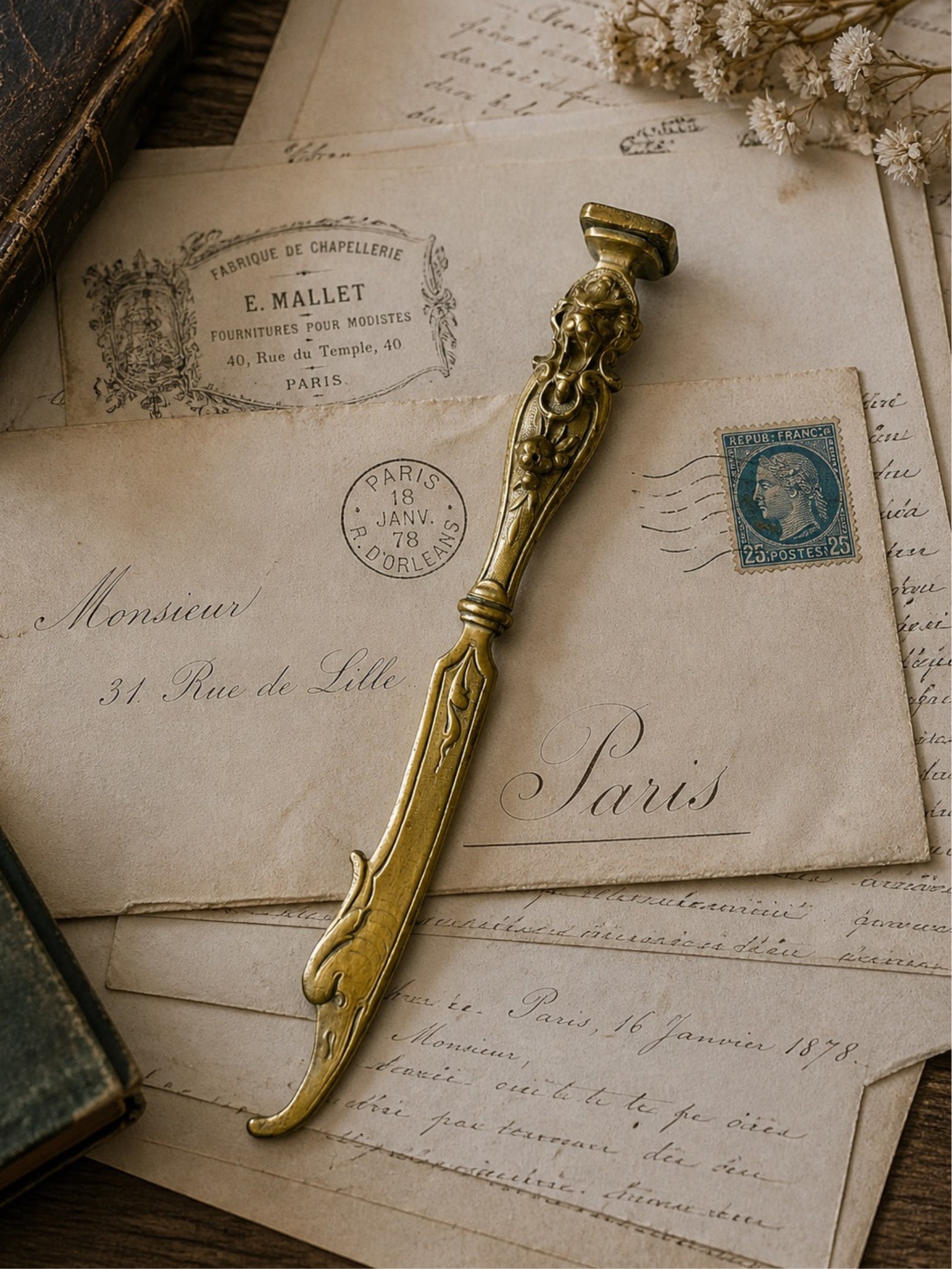 Elegant antique letter opener with monogram seal