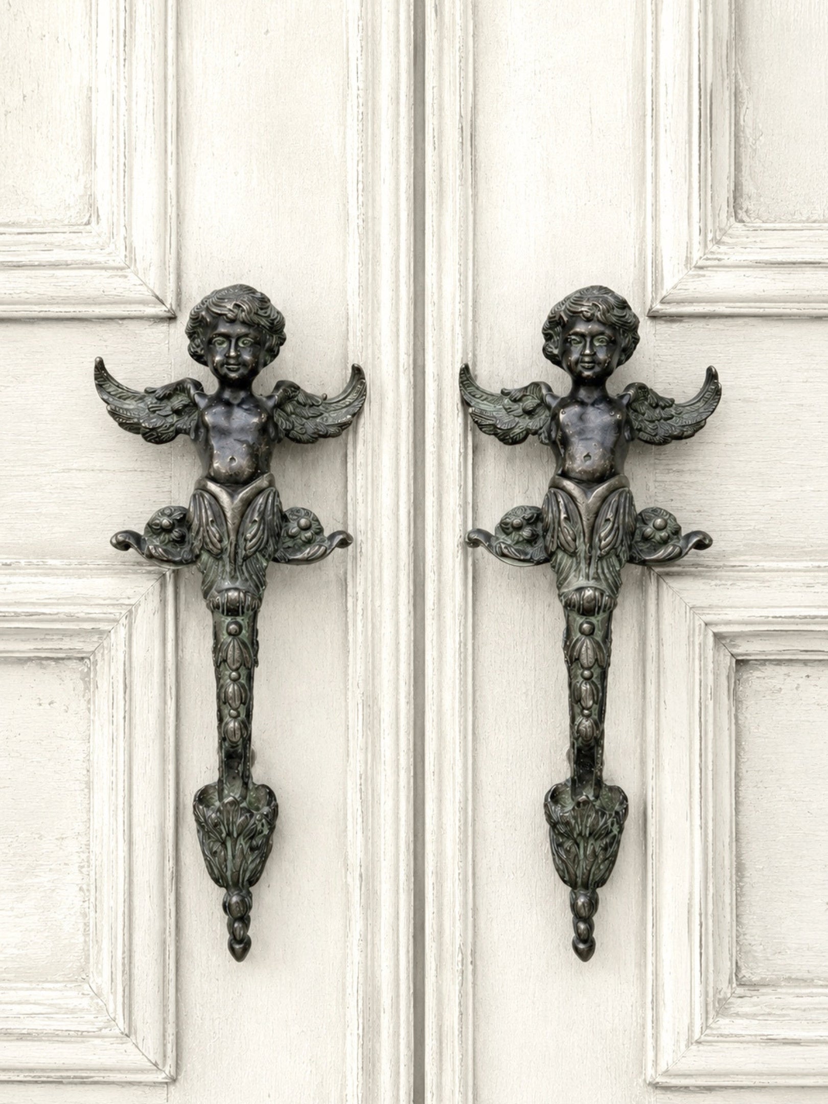 Pair of antique French solid bronze door handles