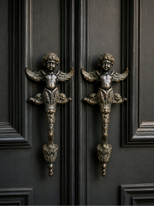 Pair of antique French solid bronze door handles